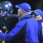 Offensive coordinator Brian Higbee gives a play to quarterback Tabor Maxwell 02