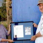 Bill Dell presents framed letter to Gail Rappa in Tuscarora