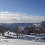 Snow on park and schoolhouse