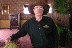 Gary Fly tending bar at the Mizpah Hotel in Tonopah Nevada